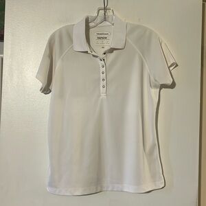 Tehama white wicking snap front polo shirt. UV protection. Raglan short sleeve